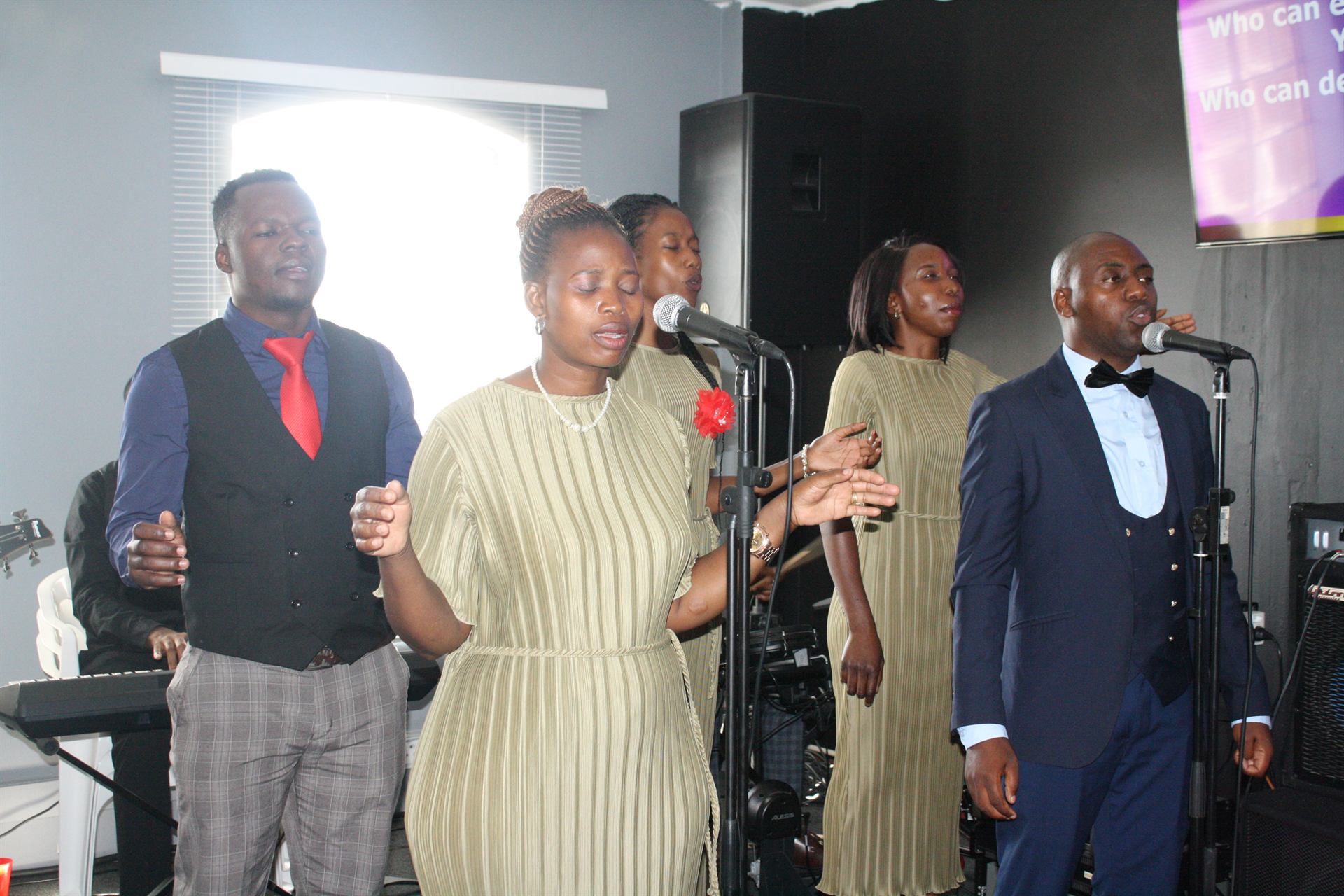 Congregants worshipping during a Sunday service